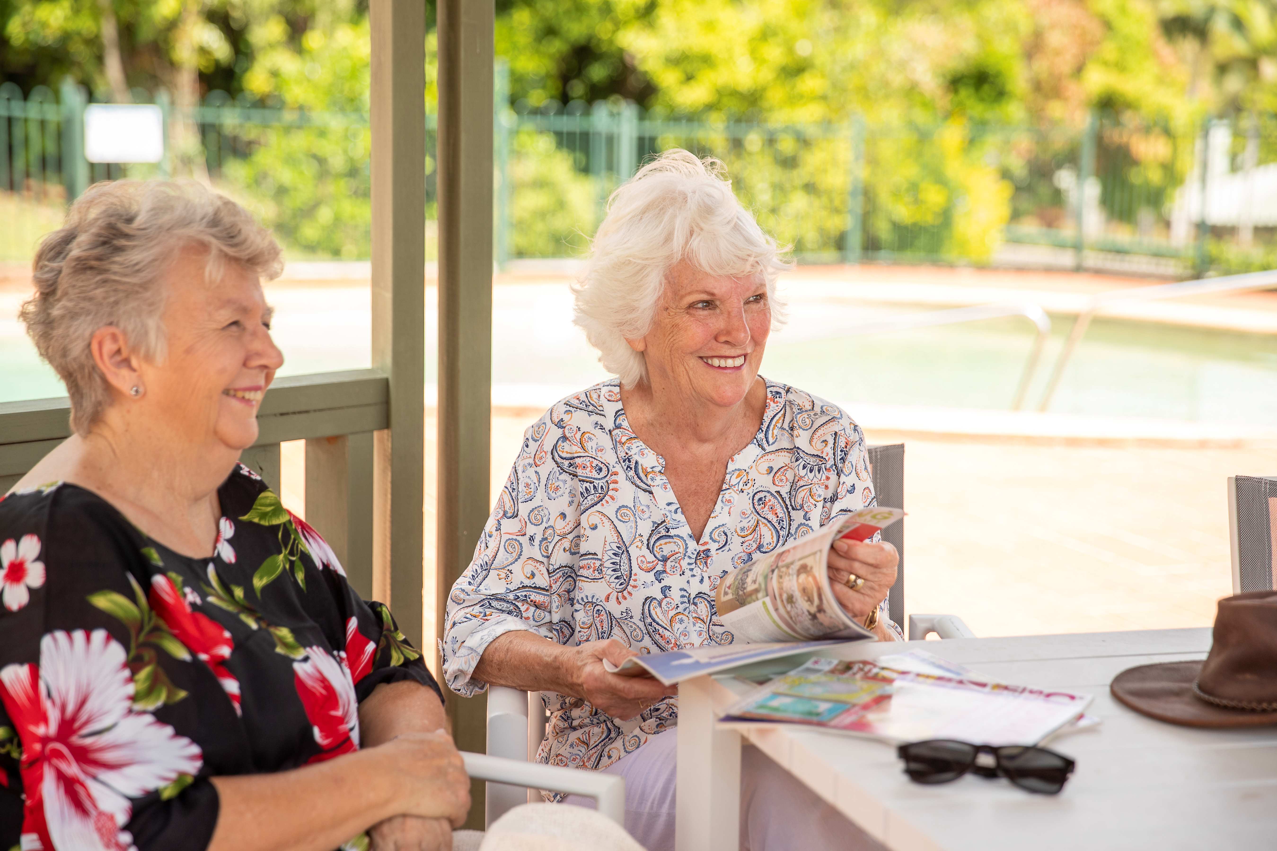 Elderly friends gathered together